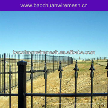 Temporary black powder coated wrought iron fence